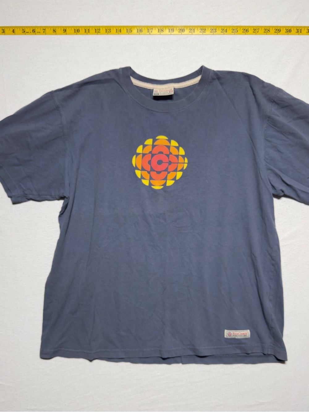 Vintage CBC news logo Blue Graphic Crewneck Tee with Yellow & Orange Logo